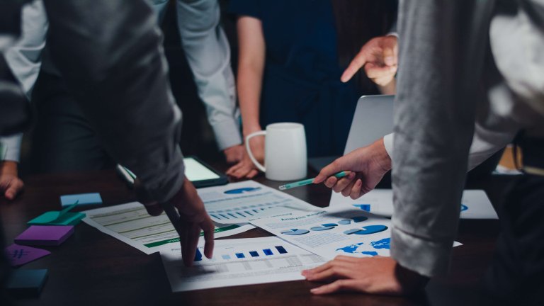 millennial-asia-businessmen-businesswomen-meeting-brainstorming-ideas-about-new-paperwork-project-colleagues-working-together-planning-success-strategy-enjoy-teamwork-small-modern-night-office (1).jpg